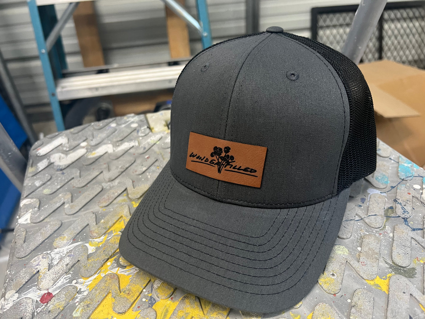 Charcoal and Black Richardson 112 hat with custom leathette patch