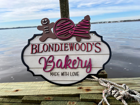 A fun sign to decorate a kitchen of someone that loves baking.